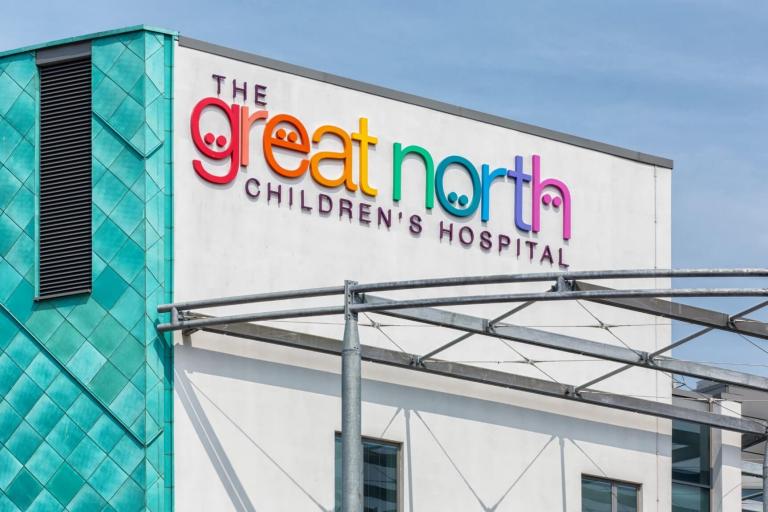 A large building with the words 'The Great North Children's Hospital' on the outside. 