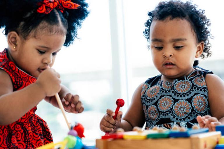 Children playing with musical instruments 