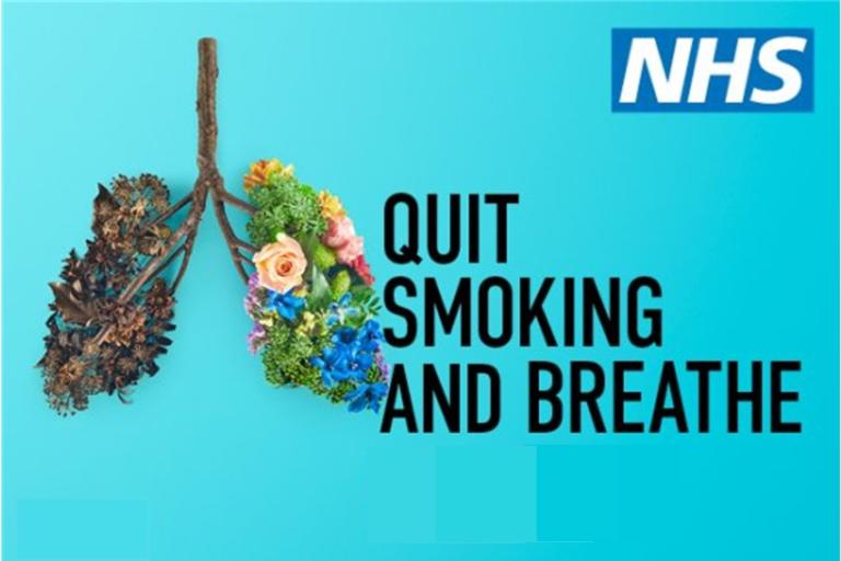 A tree branch and flowers made to look like a pair of lungs. Beside it are the words 'Quit smoking and breathe'