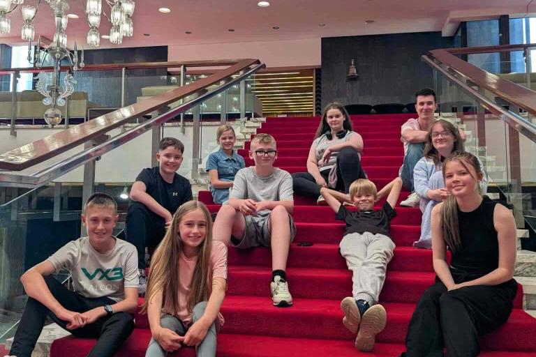 12112025 Young inspectors on the stairs 