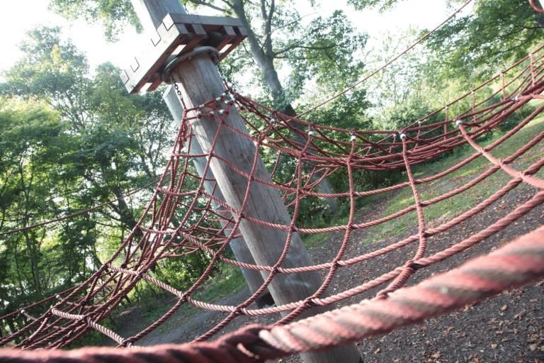 close up photo of climbable ropes in a park's play area