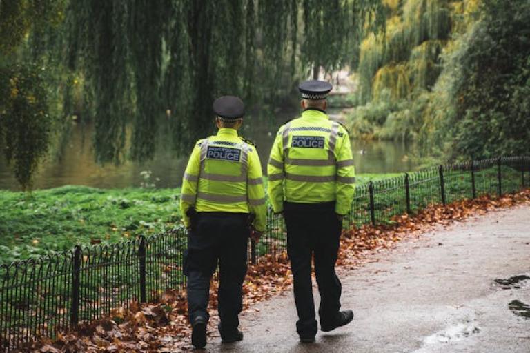 Police walking in park 