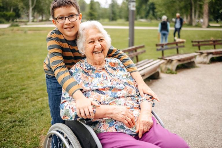Boy with Grandmother in wheelchair